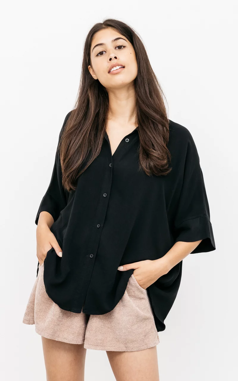 Oversized blouse met knopen Zwart