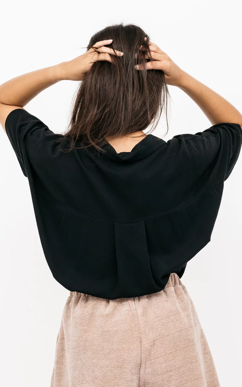 Oversized blouse met knopen Zwart