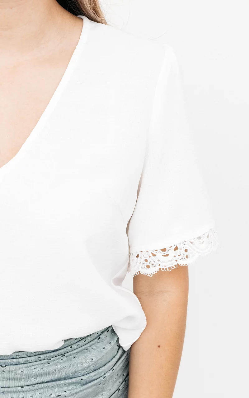 V-neck top with embroidery White