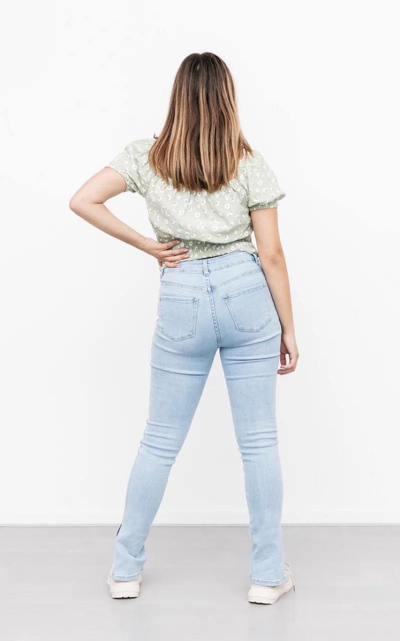 High waist jeans met split Lichtblauw