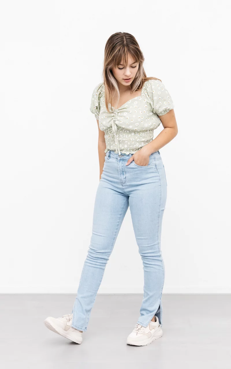 High waist jeans met split Lichtblauw