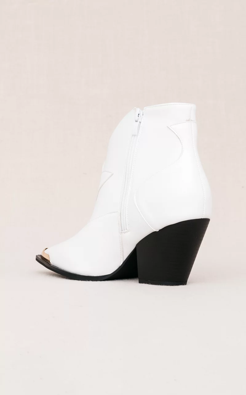 Cowboylaarsje met een goudkleurige neus Wit
