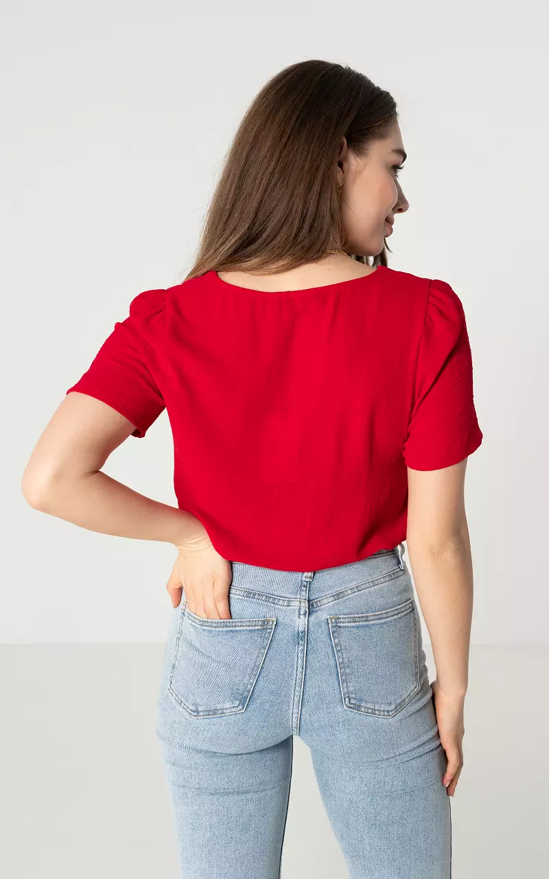 Bluse mit V-Ausschnitt und Knöpfen Rot