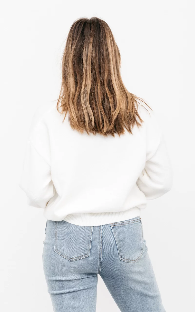 Cardigan mit Rüschen Creme