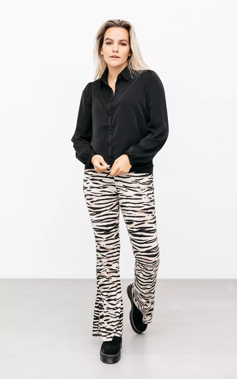 Ausgestellte Hose mit Zebra-Muster Creme Schwarz