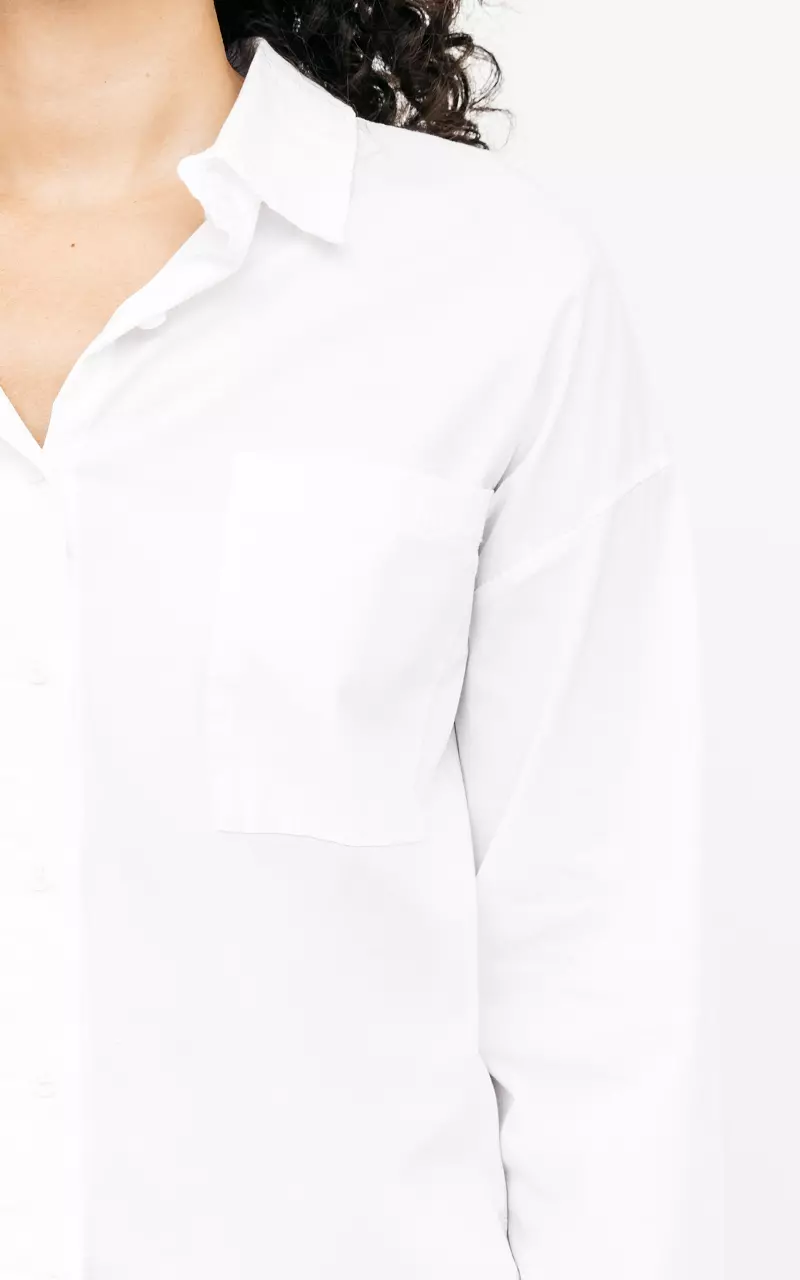 Lange Bluse mit Brusttasche Weiß