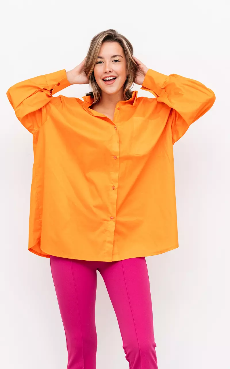 Oversized basic blouse with breast pocket Orange