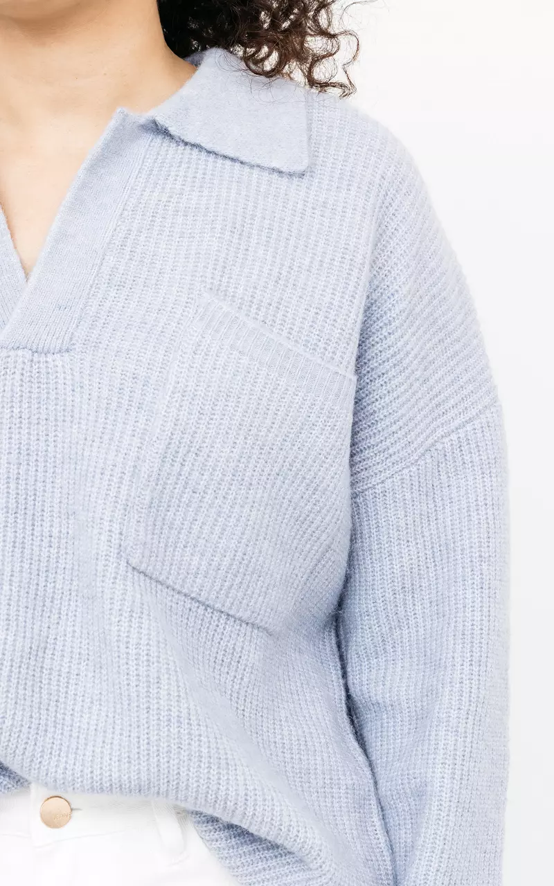 Oversized Pullover mit Brusttasche Hellblau