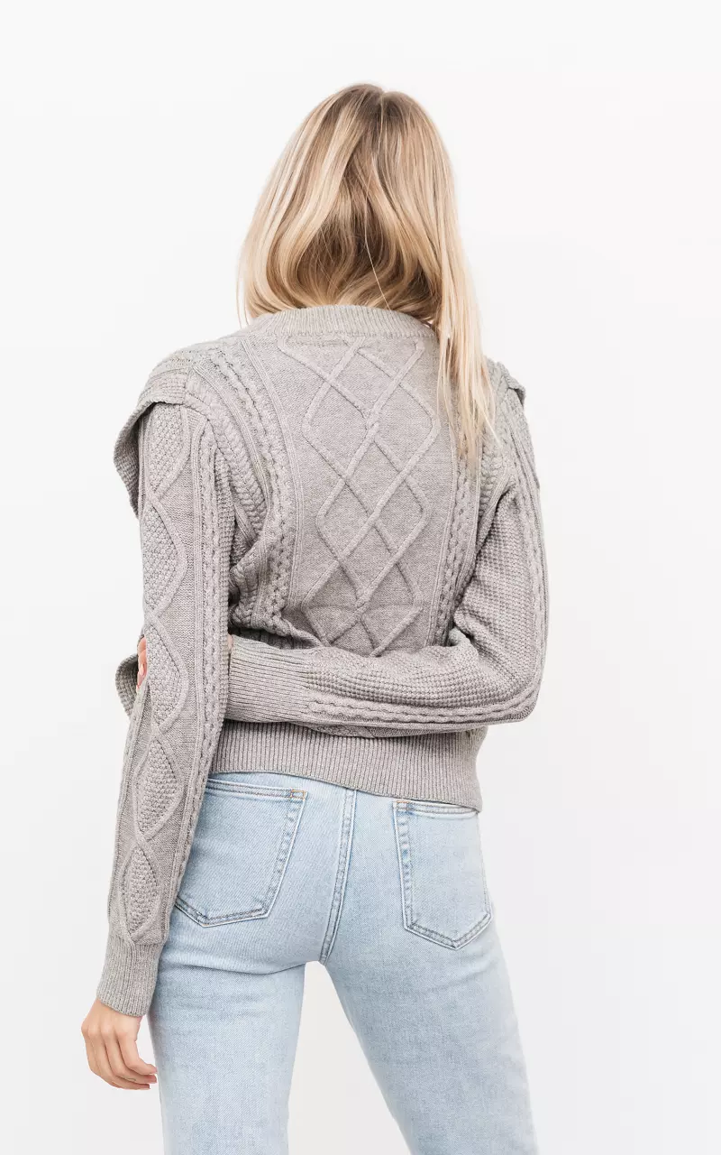 Cable-knit sweater with flounces Grey