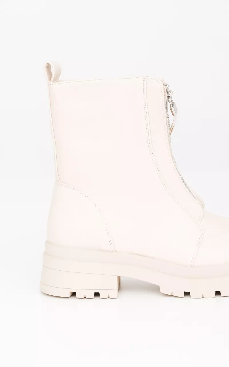 Boots with decorative zip on the front Beige
