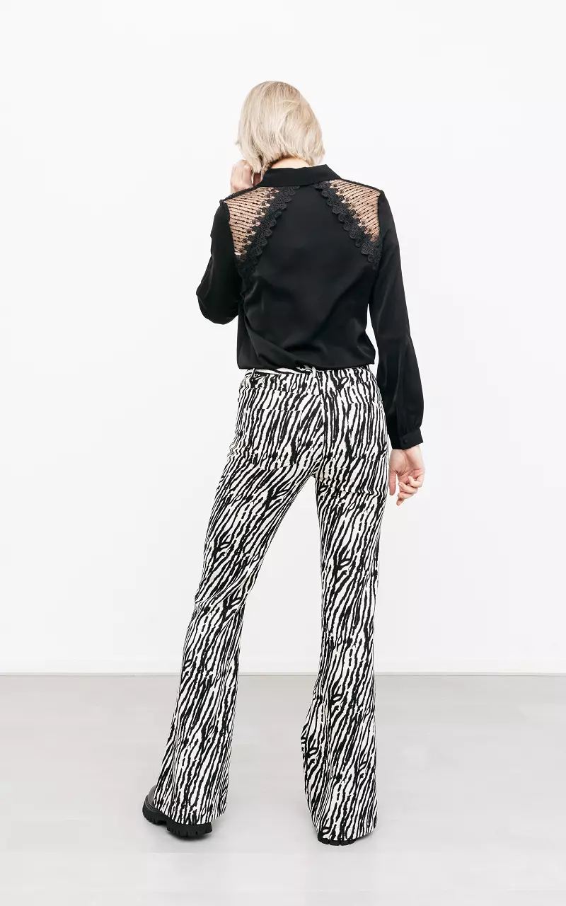 High-waist flared zebra pants Cream Black