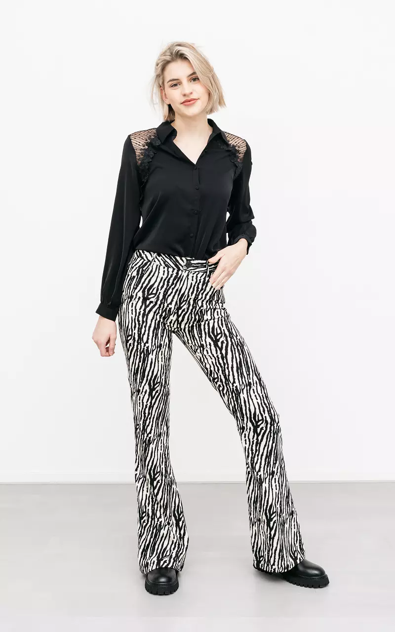 High waist flared broek met zebraprint Creme Zwart