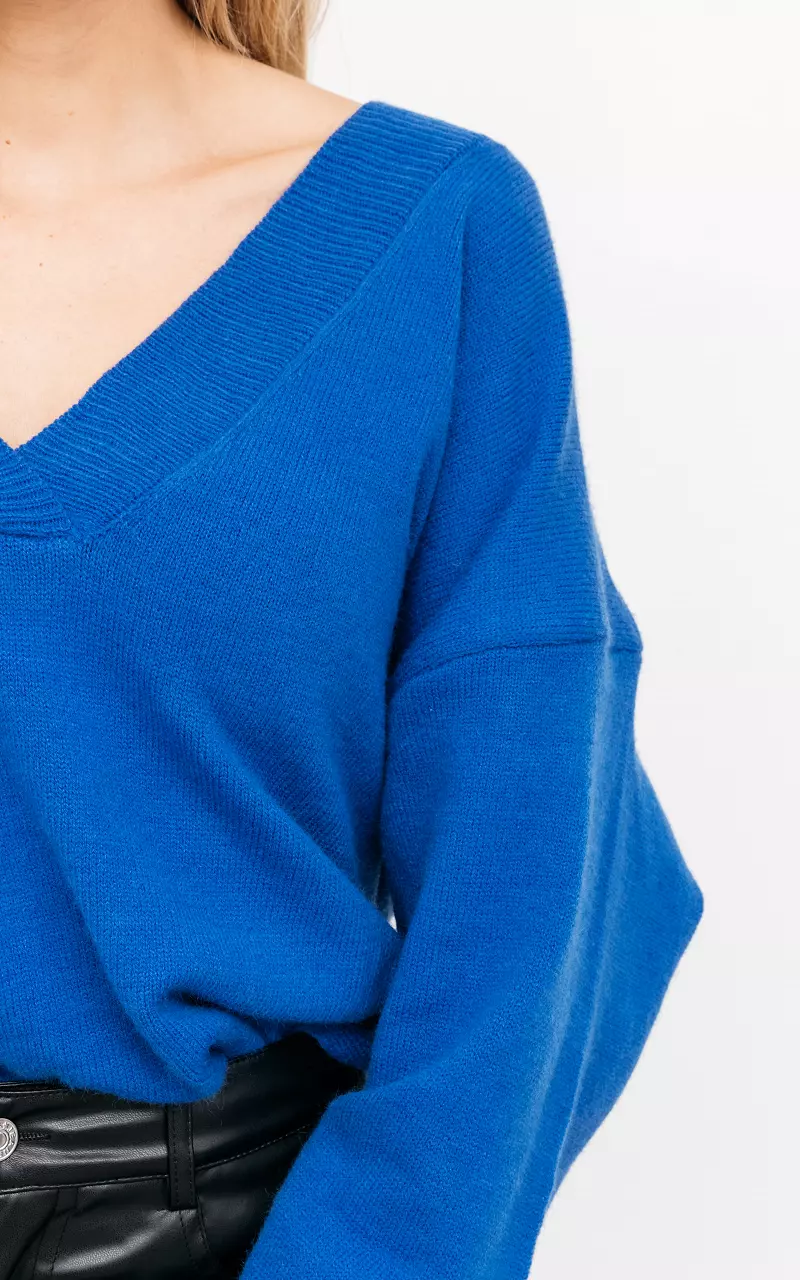 Oversized trui met v-hals Blauw