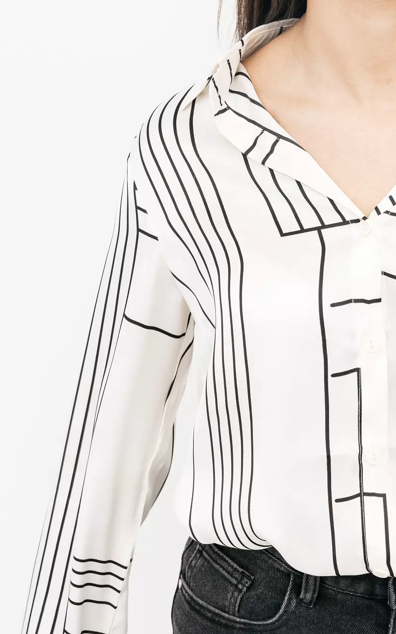 Bluse mit abstraktem Streifenmuster Schwarz Weiß