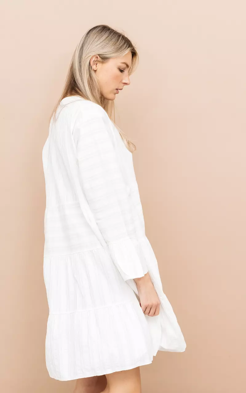 Loose-fitting dress with pearl-like buttons White