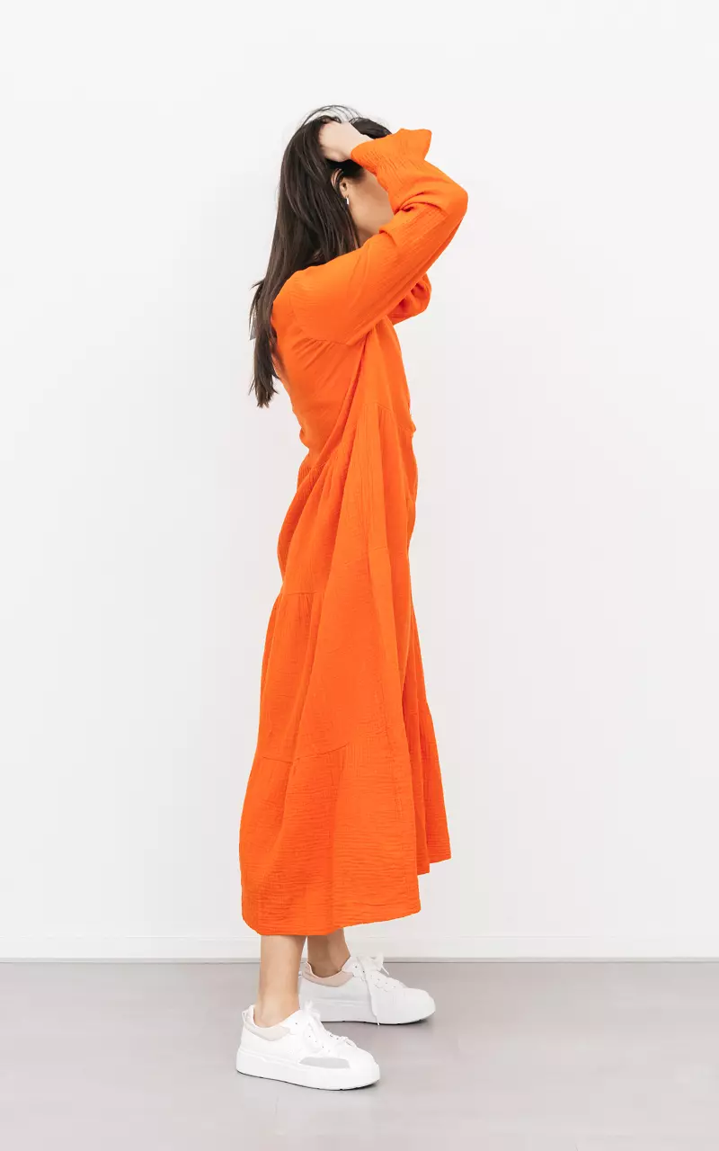 Lange jurk met parelmoer knoopjes Oranje