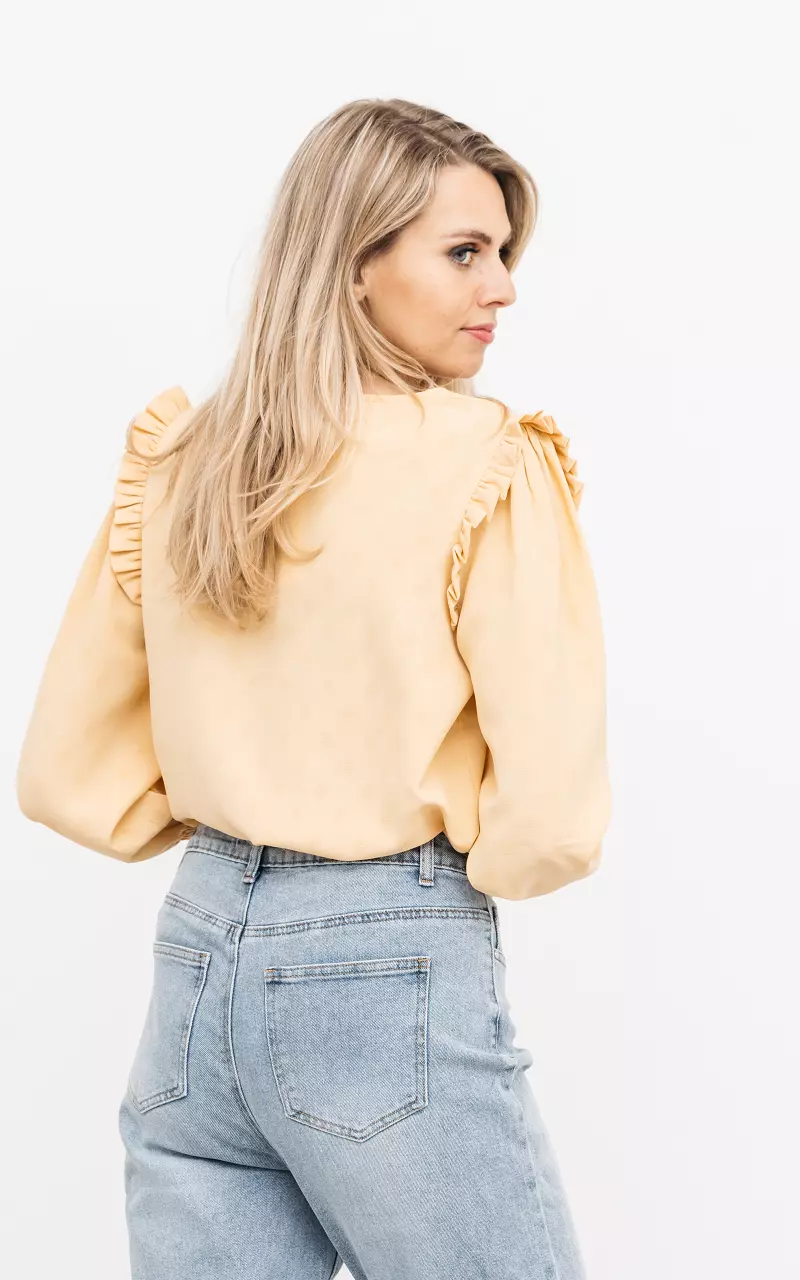 V-neck blouse with ruffles Yellow