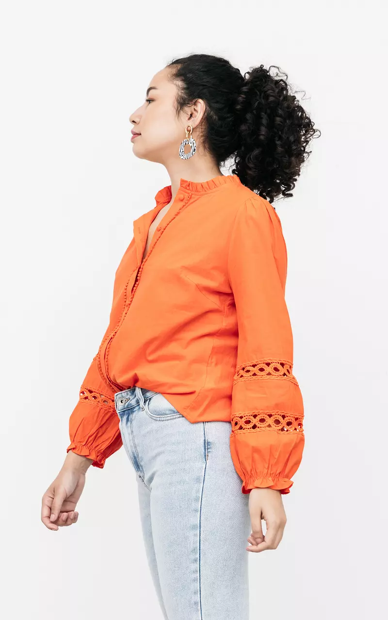 Blouse with buttons and ruffles Orange