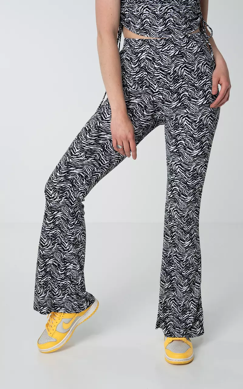 Flared pants with zebra print Black White