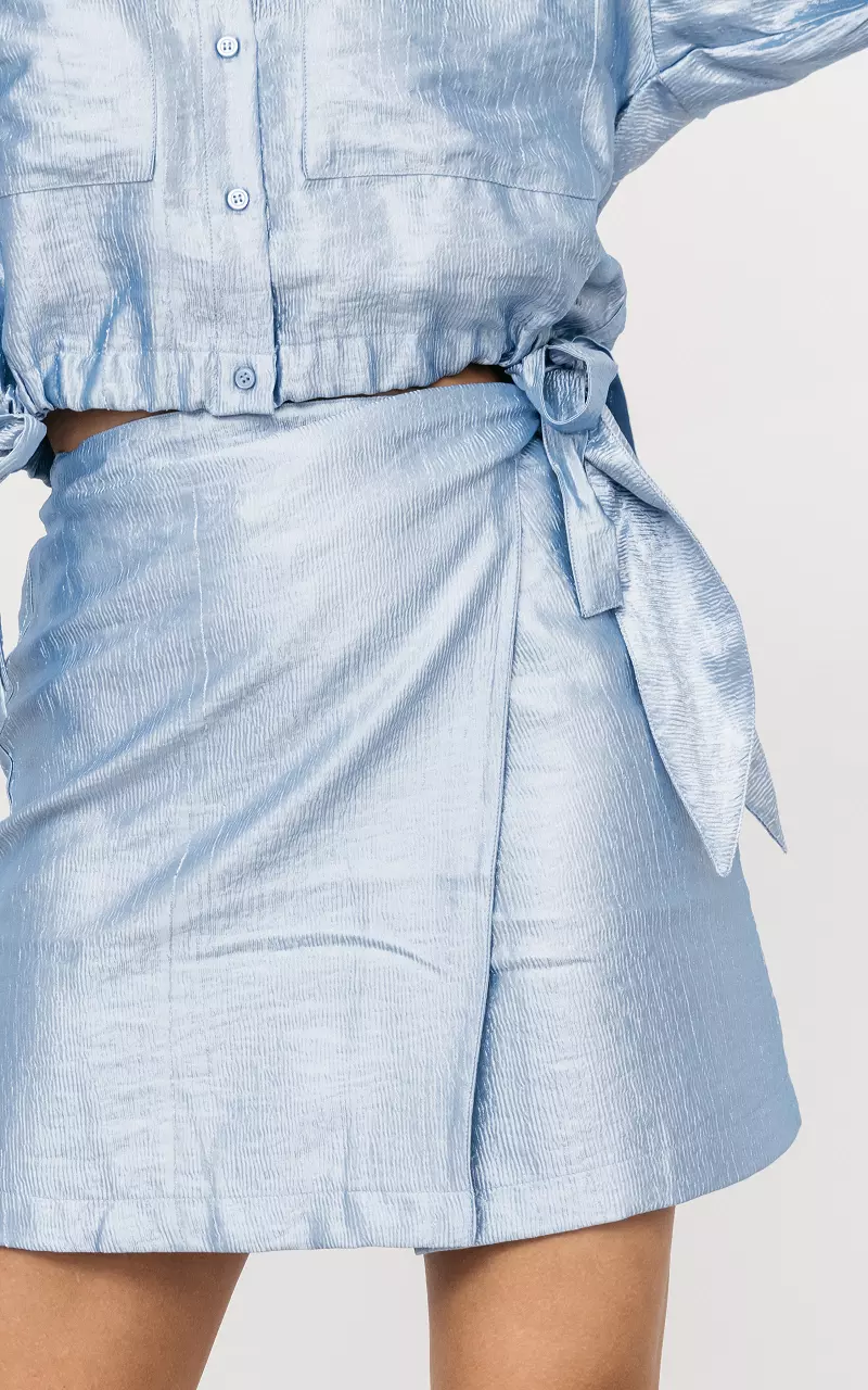 Mini rok met glanzende stof Lichtblauw