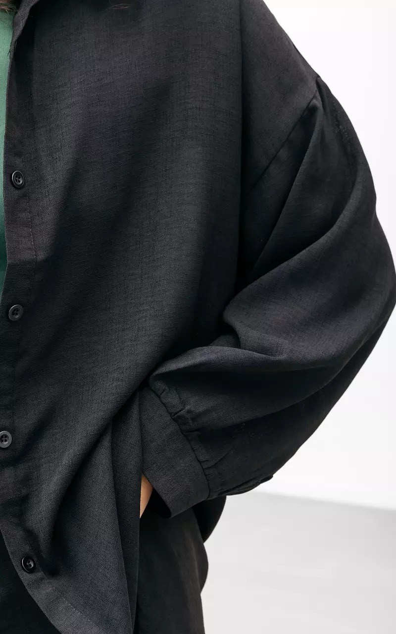 Oversized blouse met knoopjes Zwart
