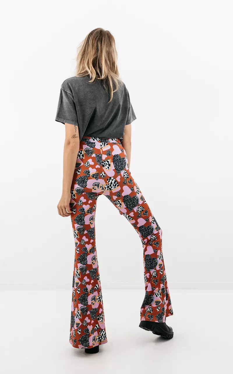 Flared pants with print Rust Brown Pink