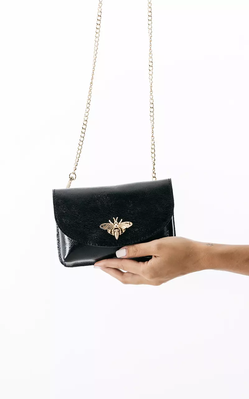 Metallic look bag with gold-coloured details Black