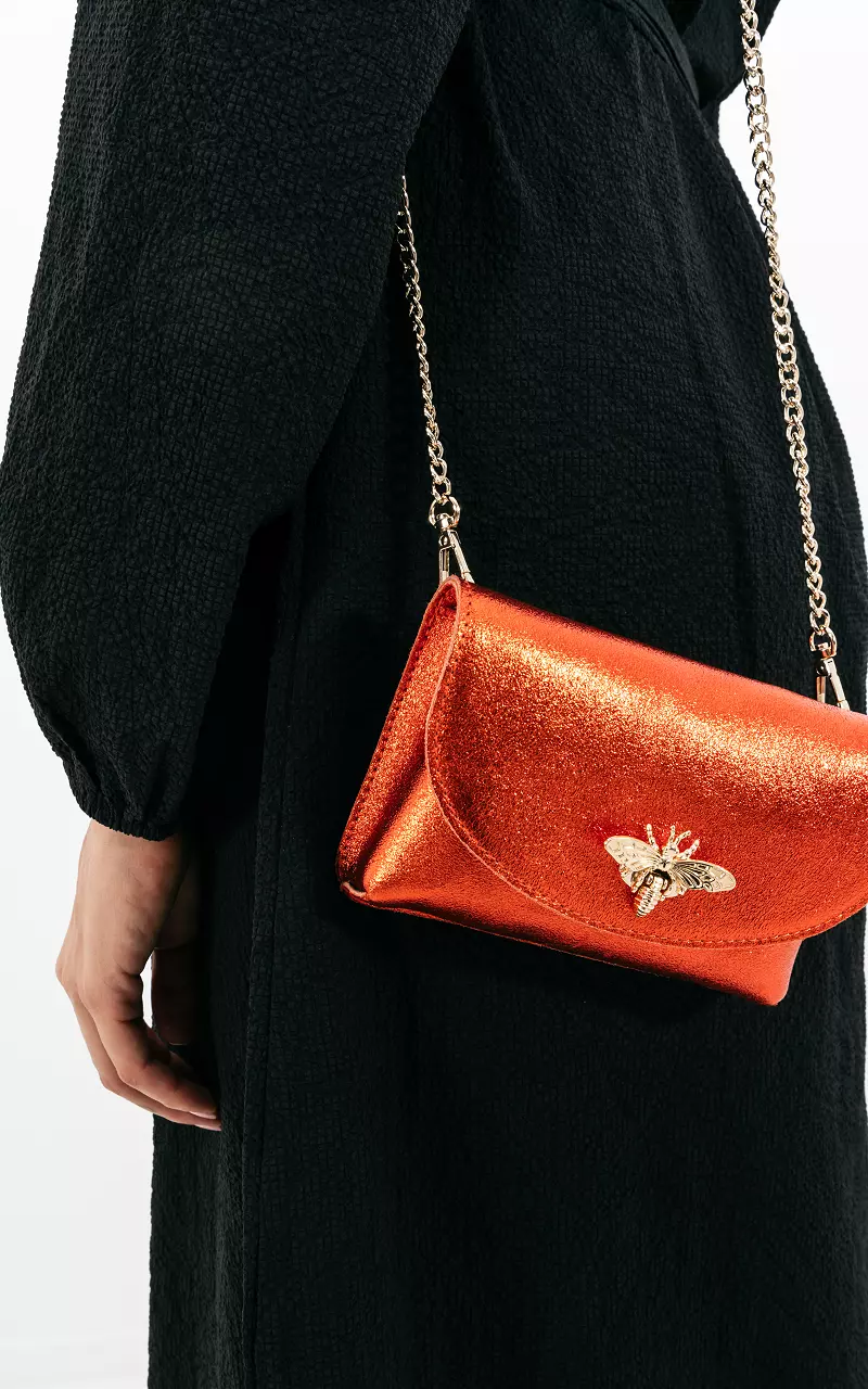 Metallic look bag with gold-coloured details Orange