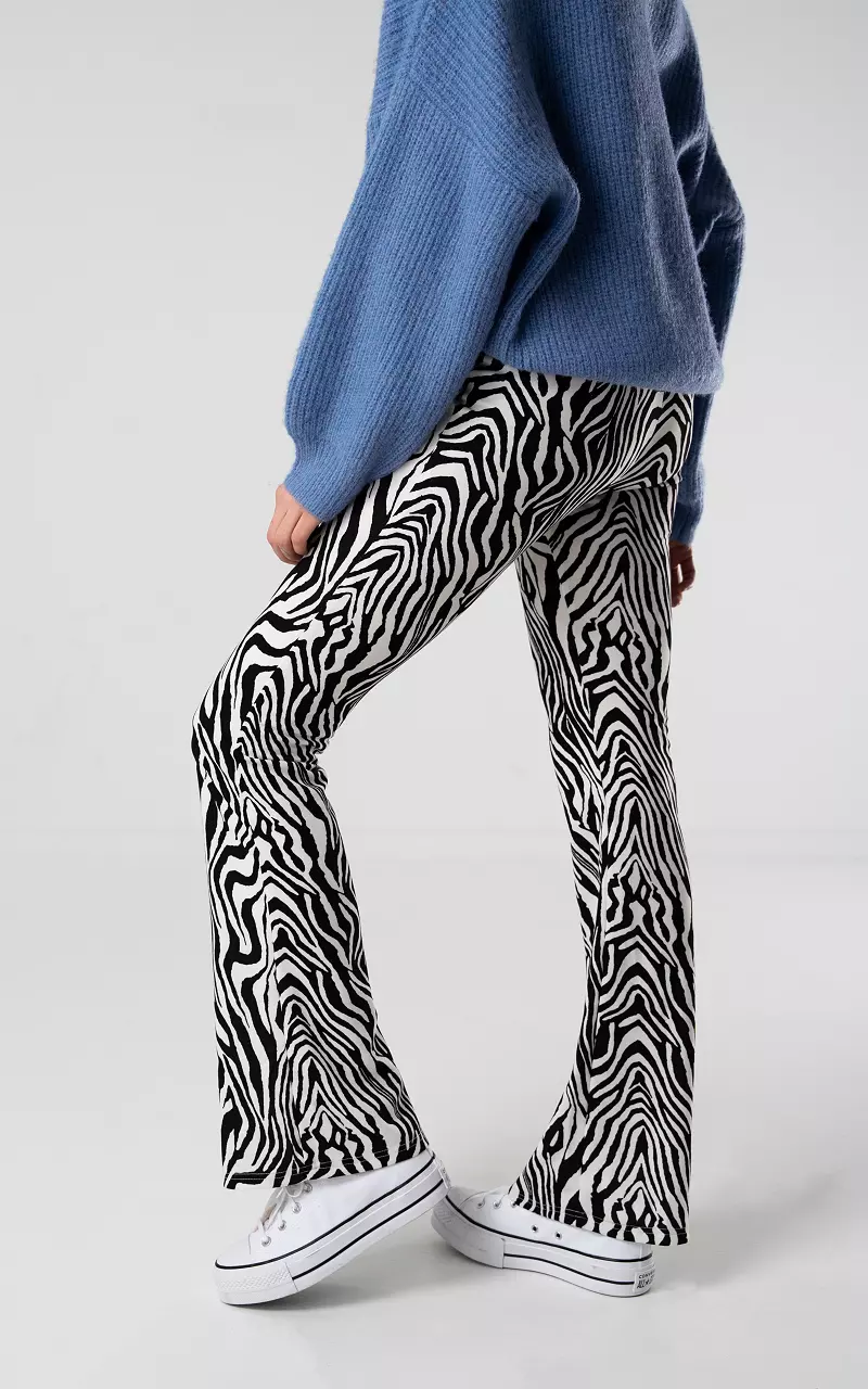 Flared trousers with zebra print White Black