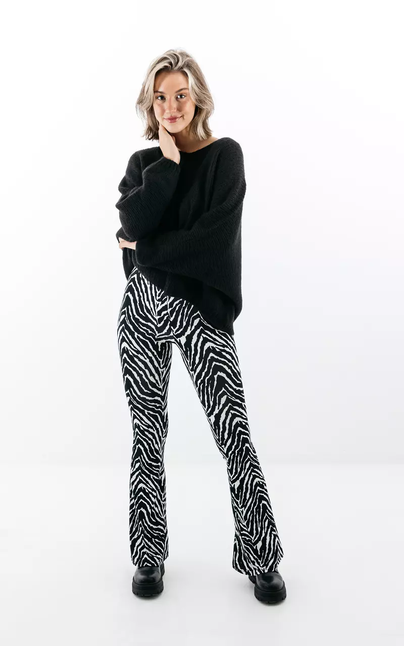Flared pants with zebra print Black White