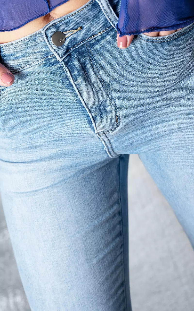 High-waist skinny jeans with split Light Blue