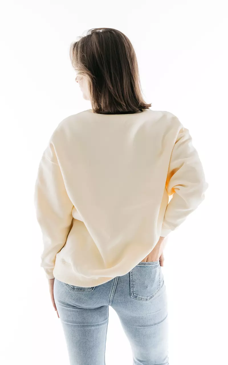 Oversized sweater with round neck Cream