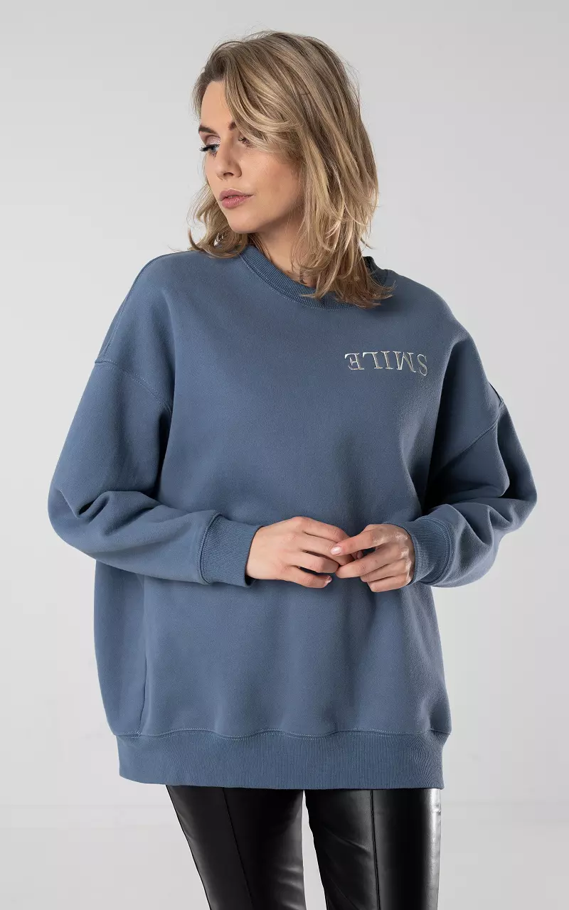 Oversized trui met tekst Blauw