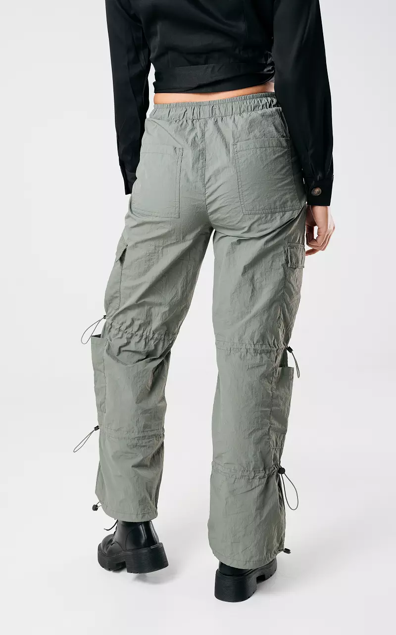 Cargo parachute pants with elastic details Green