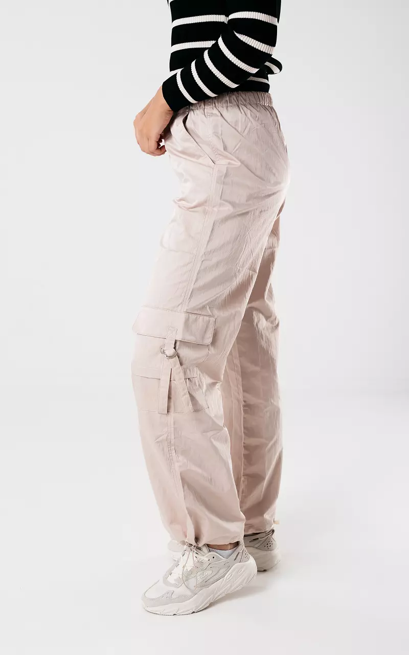 Parachute pants with silver-coloured details Beige