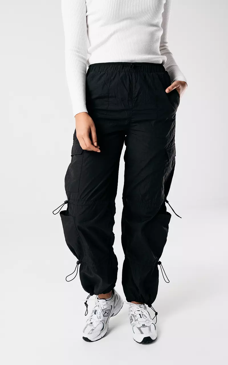 Cargo parachute pants with elastic details Black