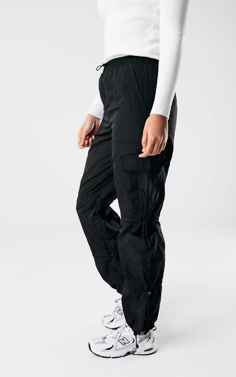 Cargo parachute pants with elastic details Black