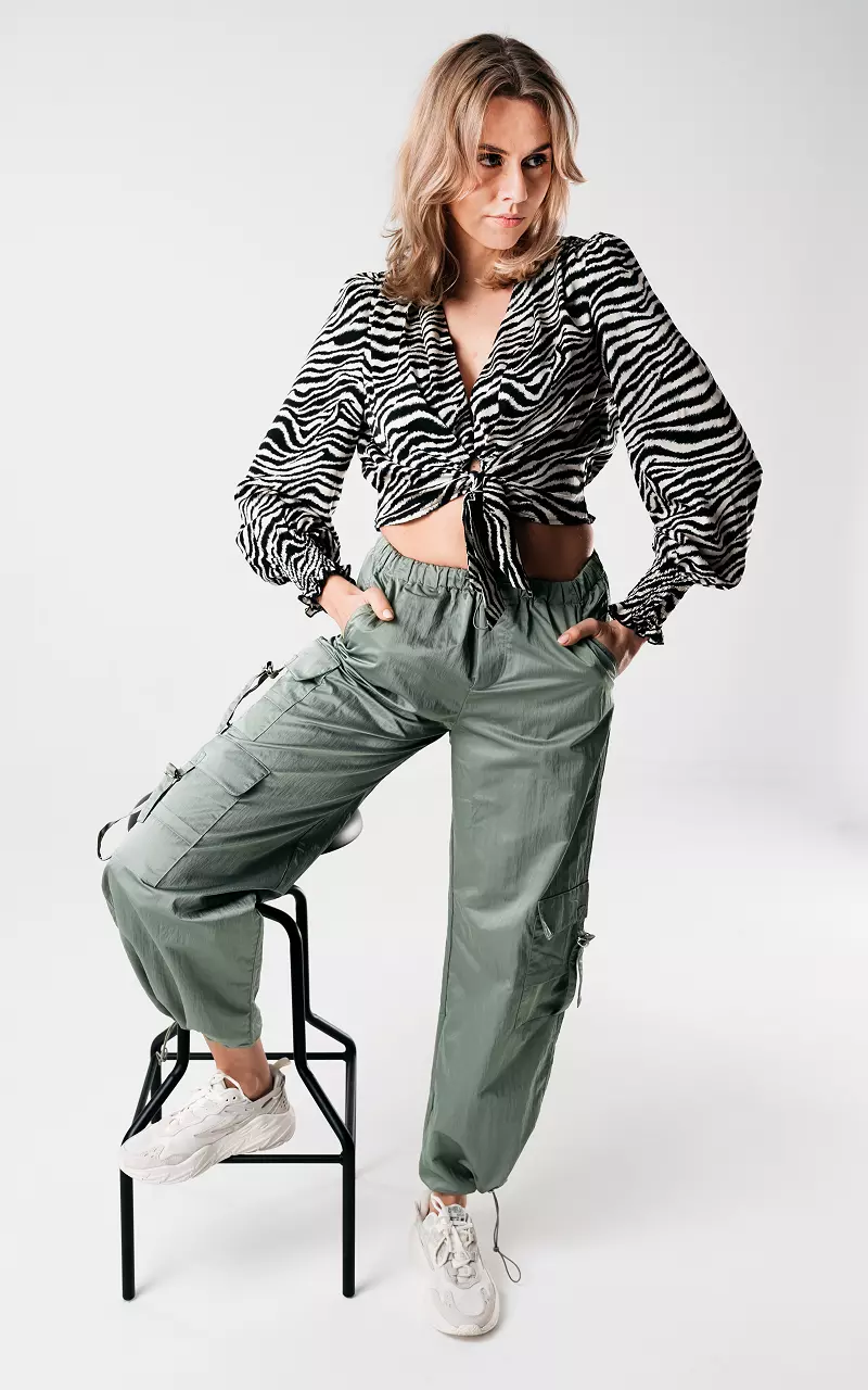 Parachute pants with silver-coloured details Green