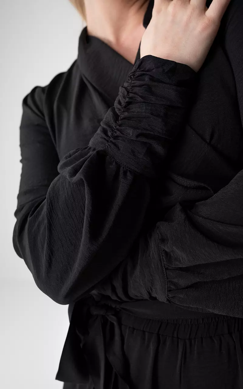 Overslag wikkeltop met strikdetail Zwart