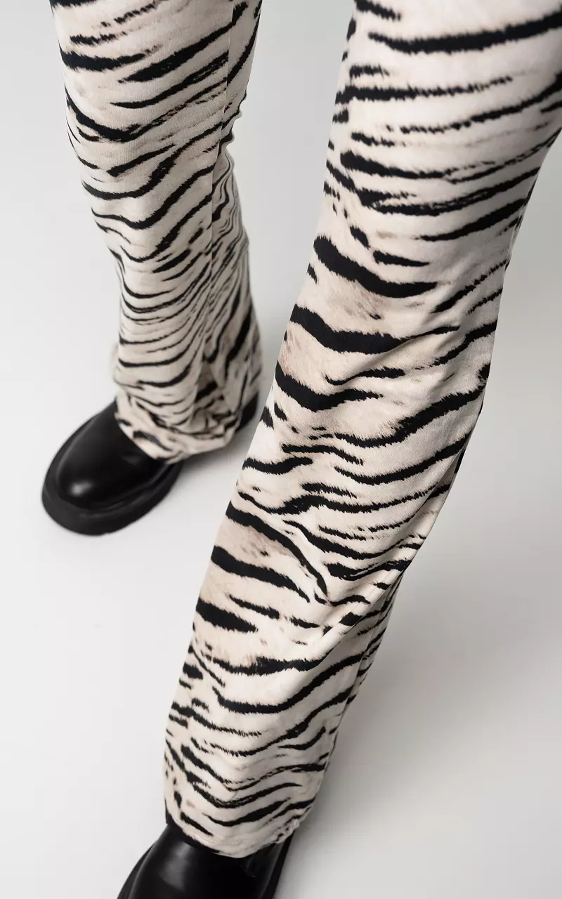 Flared broek met print Creme Zwart
