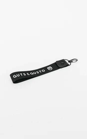 Guts Gusto keychain black white