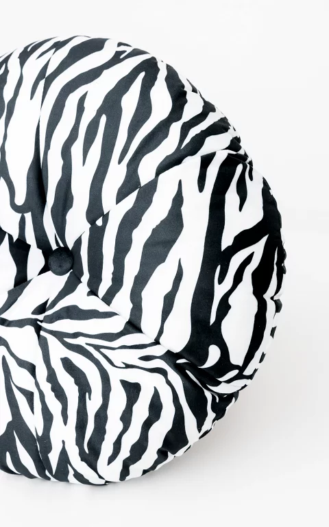 Round, zebra patterned pillow black white