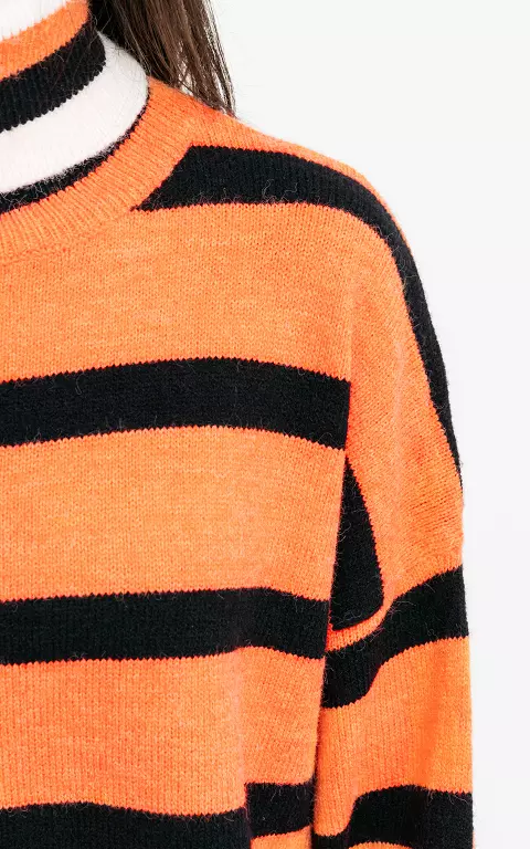 Oversized turtleneck sweater with stripes orange black