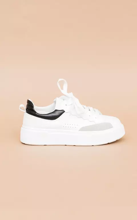 Sneakers with high soles white black