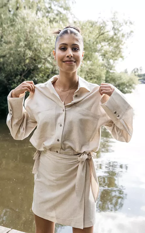 Kort model blouse met strikdetail beige