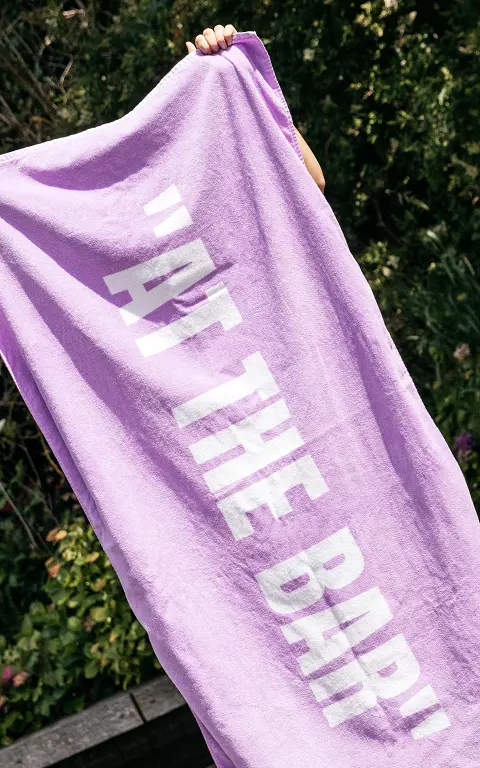 Beach towel with text lilac white