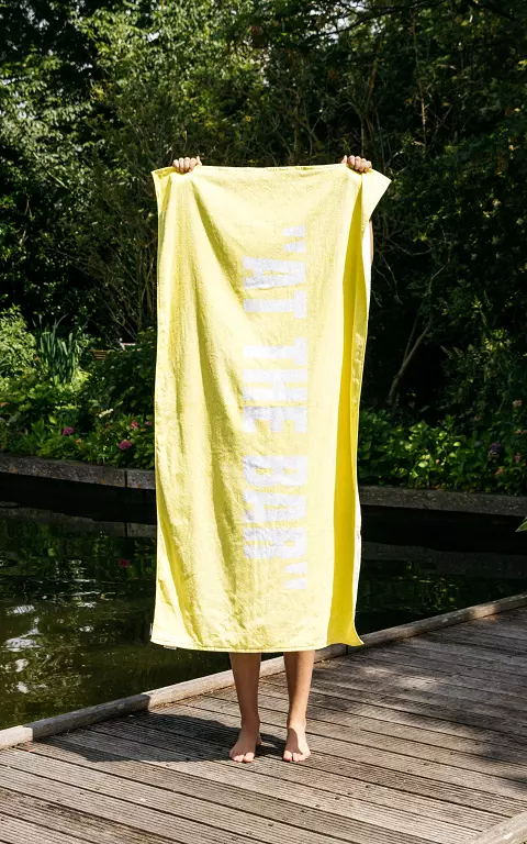 Beach towel with text yellow white