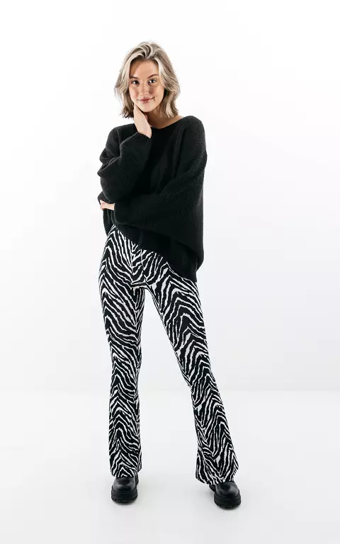 Flared pants with zebra print 