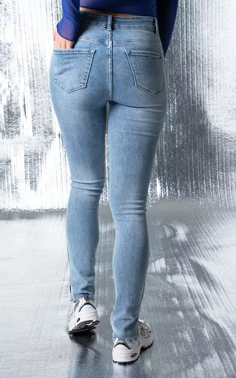 High waist skinny jeans met split lichtblauw