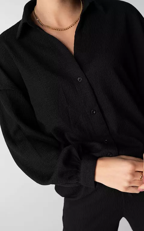 Oversized blouse met knoopjes zwart